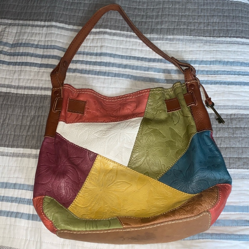 Fossil women’s multi-color patch leather handbag.